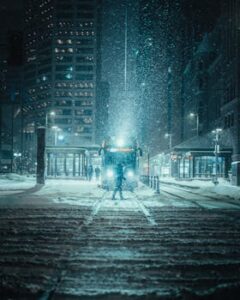 Person Standing in Front of a Train