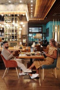 Couple Having Dinner in a Restaurant